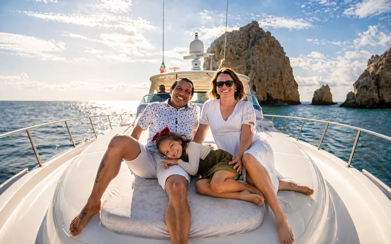 Family enjoying a yacht escape near El Arco