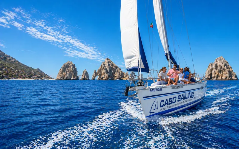 Sailing in Cabo San Lucas along the rocky coastline